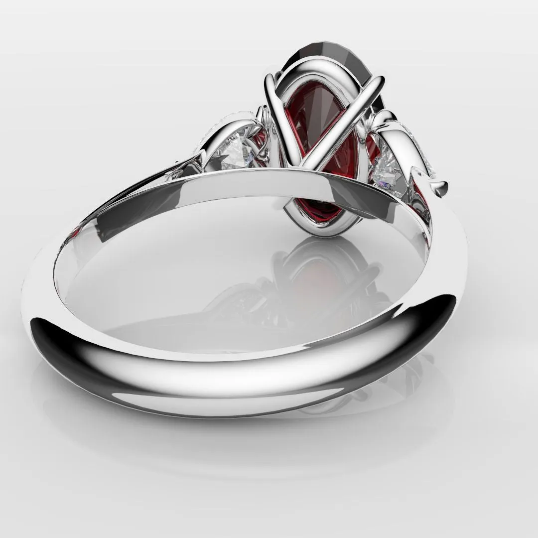 Oval Ruby and Heart Diamond Trilogy Engagement Ring